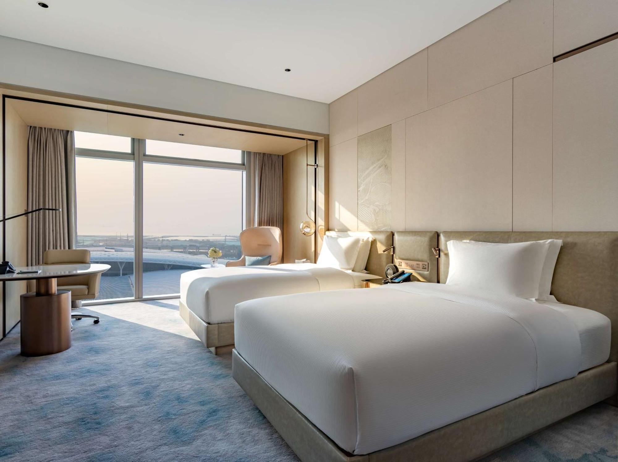 Отель Hilton Shenzhen World Exhibition & Convention Center - Only 5 Minutes' Walk To Wecc Экстерьер фото